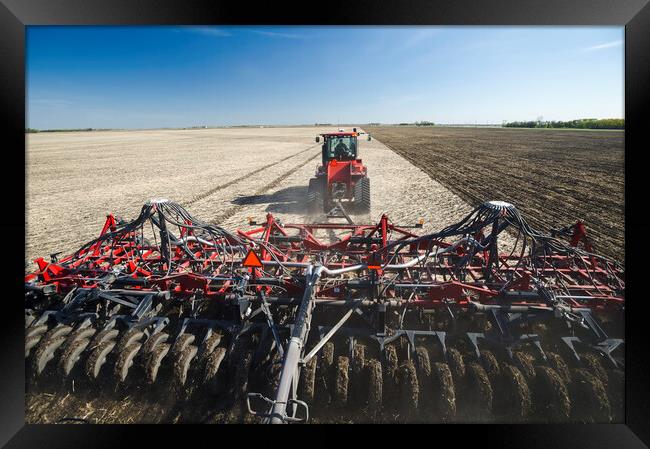 moving tractor and and air till seeder planting soybeans Framed Print by Dave Reede