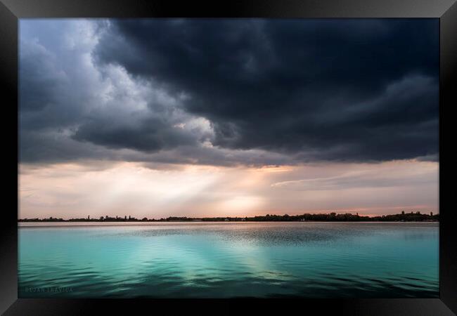 Turquoise lake under the cloudy sky Framed Print by Dejan Travica