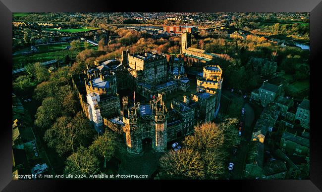 Aerial view of the Lancaster castle surrounded by greenery at sunset, showcasing the architecture and landscape. Framed Print by Man And Life