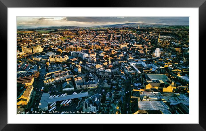 Aerial view of a city Lancaster at sunset with warm lighting highlighting the buildings and streets, showcasing the urban landscape. Framed Mounted Print by Man And Life