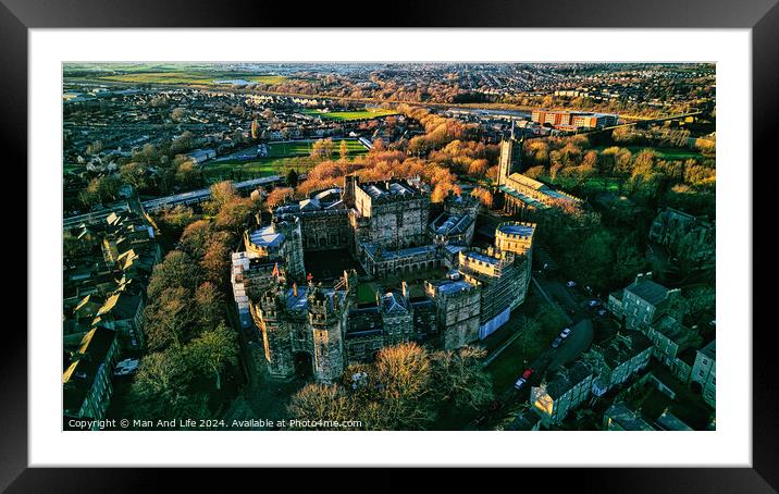 Aerial view of a majestic Lancaster castle surrounded by greenery with a town in the background during sunset. Framed Mounted Print by Man And Life