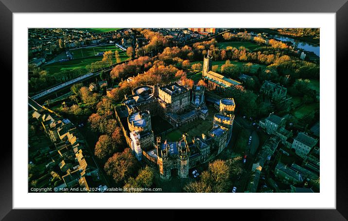 Aerial view of a historic Lancaster castle at sunset with surrounding greenery and roads. Framed Mounted Print by Man And Life