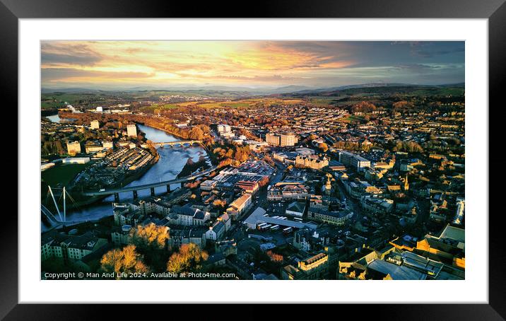 Aerial view of a city Lancaster at sunset with warm lighting, showcasing the urban landscape, buildings, and a river flowing through the center. Framed Mounted Print by Man And Life