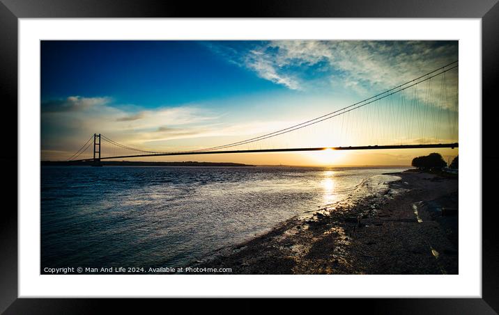 A bridge over a body of water Framed Mounted Print by Man And Life