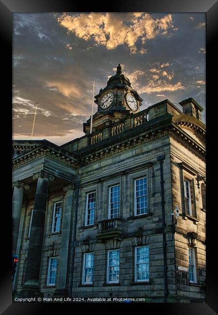 Historic building with clock tower against a dramatic sunset sky in Lancaster. Framed Print by Man And Life