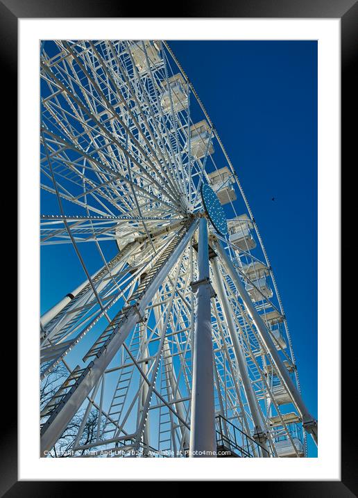 Low-angle view of a Ferris wheel against a clear blue sky in Lancaster. Framed Mounted Print by Man And Life