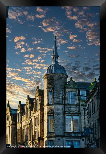Historic building with a spire against a dramatic sky with golden sunset clouds in Lancaster. Framed Print by Man And Life