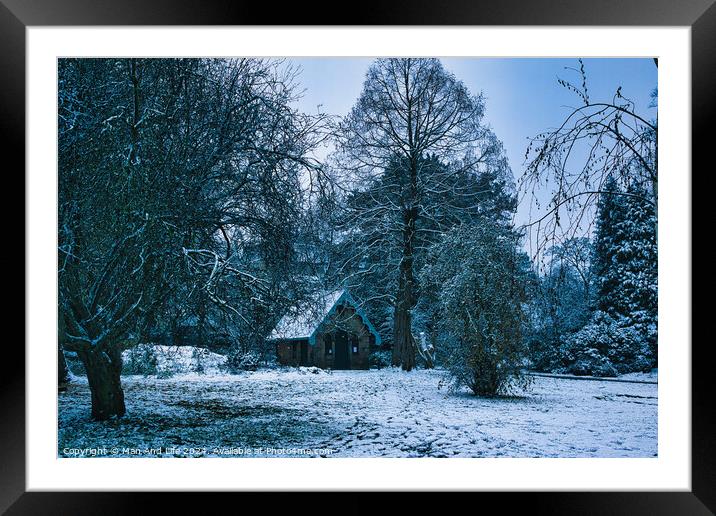 A house covered in snow Framed Mounted Print by Man And Life