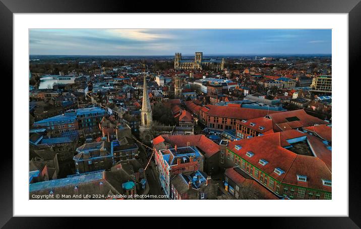 Aerial view of a historic city at dusk with prominent cathedral and urban landscape in York, North Yorkshire Framed Mounted Print by Man And Life