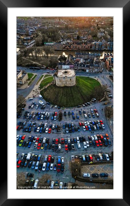 Aerial view of a circular building surrounded by a parking lot with cars during twilight in York, North Yorkshire Framed Mounted Print by Man And Life