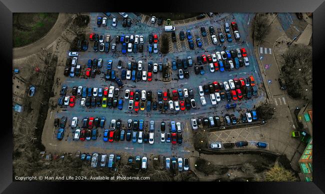 Aerial view of a crowded parking lot with various cars neatly parked in rows, showcasing urban transportation and infrastructure in York, North Yorkshire Framed Print by Man And Life