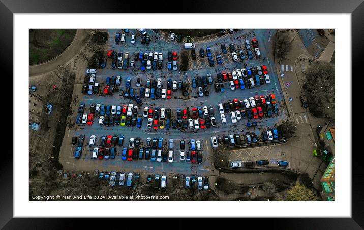 Aerial view of a crowded parking lot with various cars neatly parked in rows, showcasing urban transportation and infrastructure in York, North Yorkshire Framed Mounted Print by Man And Life