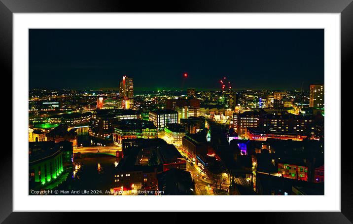 City skyline at night with illuminated buildings and vibrant urban lights in Leeds, UK. Framed Mounted Print by Man And Life