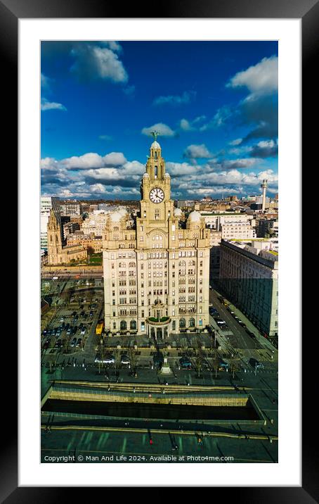 Aerial view of the historic Royal Liver Building in Liverpool, UK, with dramatic clouds in the sky. Framed Mounted Print by Man And Life