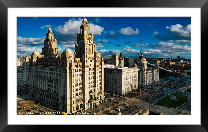 Dramatic skyline with historic buildings under a cloudy blue sky in Liverpool, UK. Framed Mounted Print by Man And Life
