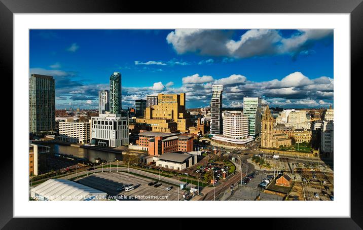 Panoramic cityscape with modern skyscrapers under a blue sky with fluffy clouds in Liverpool, UK. Framed Mounted Print by Man And Life