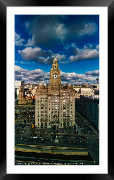 Dramatic sky over historic clock tower building in urban landscape in Liverpool, UK. Framed Mounted Print by Man And Life
