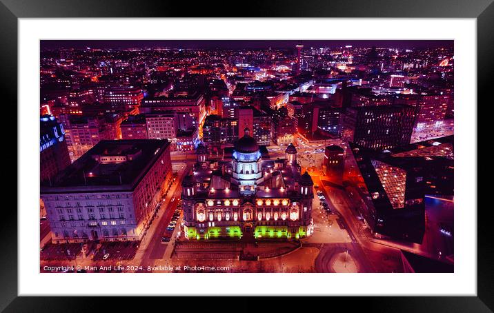 Aerial night view of a vibrant cityscape with illuminated buildings and streets in Liverpool, UK. Framed Mounted Print by Man And Life