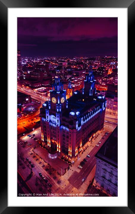 Vertical cityscape at night with illuminated historic building against a purple sky in Liverpool, UK. Framed Mounted Print by Man And Life