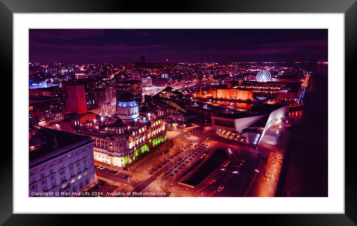 Aerial night view of a vibrant cityscape with illuminated streets and buildings in Liverpool, UK. Framed Mounted Print by Man And Life