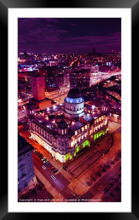 Aerial night view of an illuminated historic building in an urban setting, showcasing vibrant city lights and architecture in Liverpool, UK. Framed Mounted Print by Man And Life