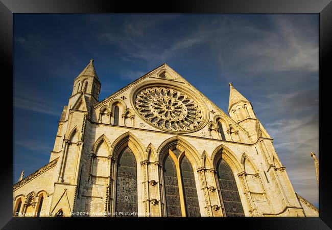 Gothic cathedral facade with rose window under blue sky in York, UK. Framed Print by Man And Life