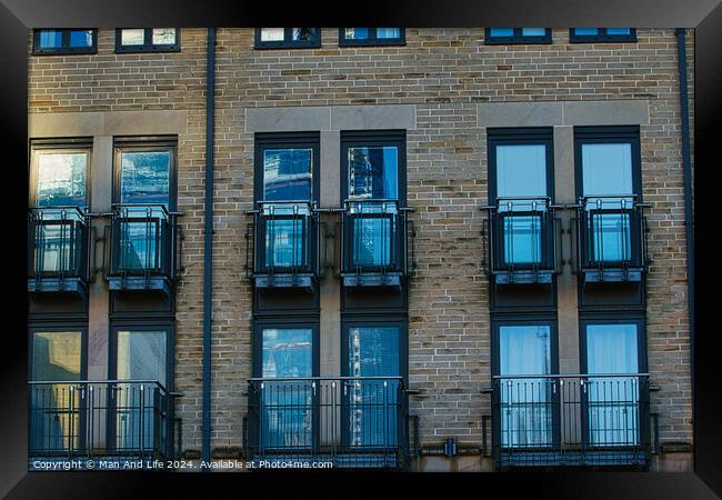 Modern apartment building facade with symmetrical windows and balconies, urban architecture background in Harrogate, England. Framed Print by Man And Life