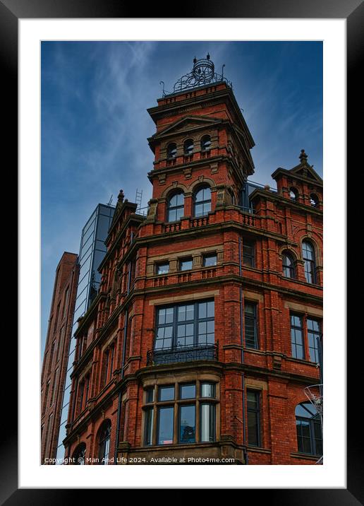 Victorian red brick building with ornate architecture against a dramatic cloudy sky, showcasing a contrast of historical and modern urban design in Leeds, UK. Framed Mounted Print by Man And Life