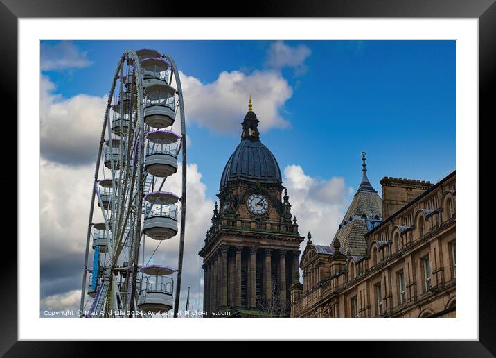 Ferris wheel beside a historic clock tower under a blue sky with clouds in Leeds, UK. Framed Mounted Print by Man And Life