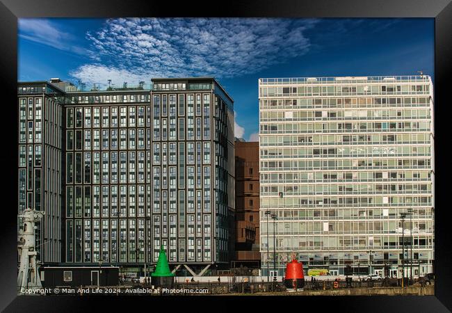 Modern office buildings with reflective glass facades under a blue sky with scattered clouds in Liverpool, UK. Framed Print by Man And Life