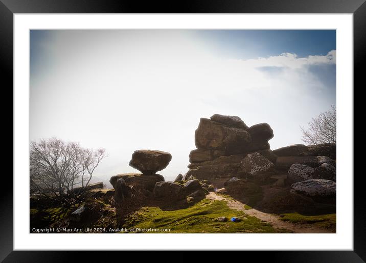 Misty landscape with balancing rock formations and a clear path under a bright sky at Brimham Rocks, in North Yorkshire Framed Mounted Print by Man And Life