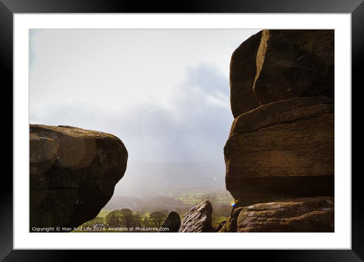 Scenic view of a landscape through rock formations under a cloudy sky at Brimham Rocks, in North Yorkshire Framed Mounted Print by Man And Life