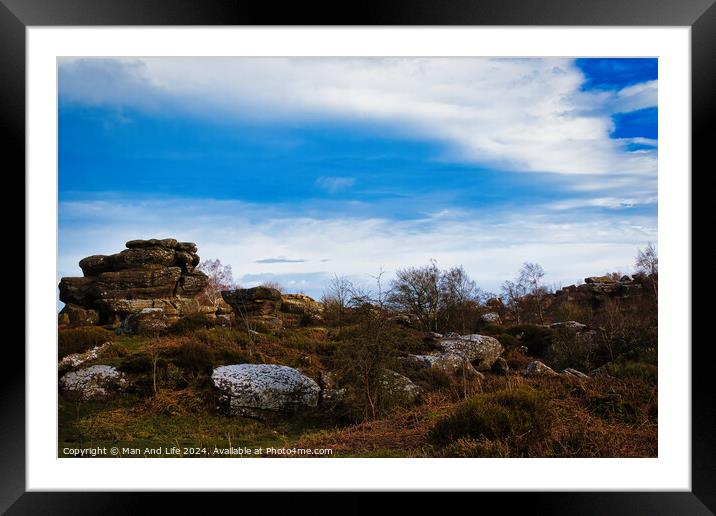 Scenic view of rock formations under a dramatic blue sky with clouds at Brimham Rocks, in North Yorkshire Framed Mounted Print by Man And Life