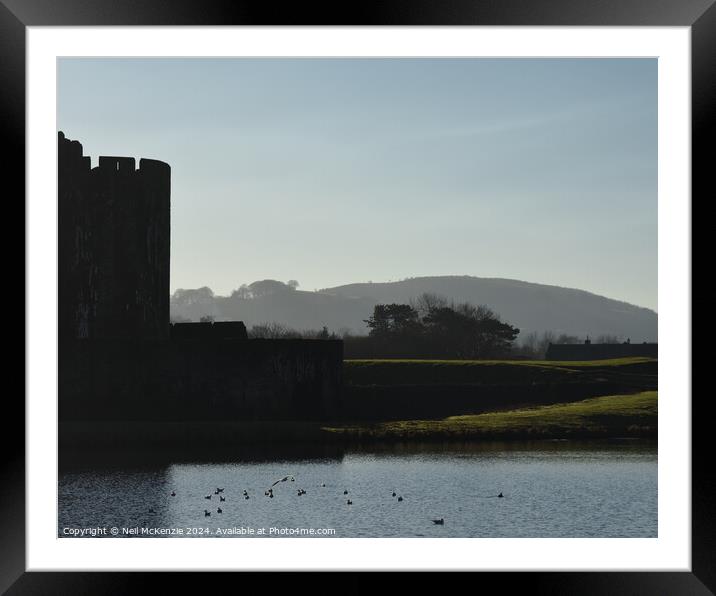 Caerphilly Castle at sunrise  Framed Mounted Print by Neil McKenzie