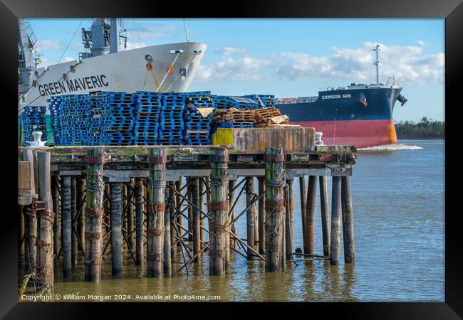 Two Cargo Ships and a Loading Dock on the Mississippi River in New Orleans Framed Print by William Morgan