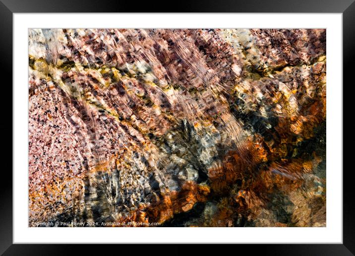 Abstract water over coloured rocks Framed Mounted Print by Paul Edney