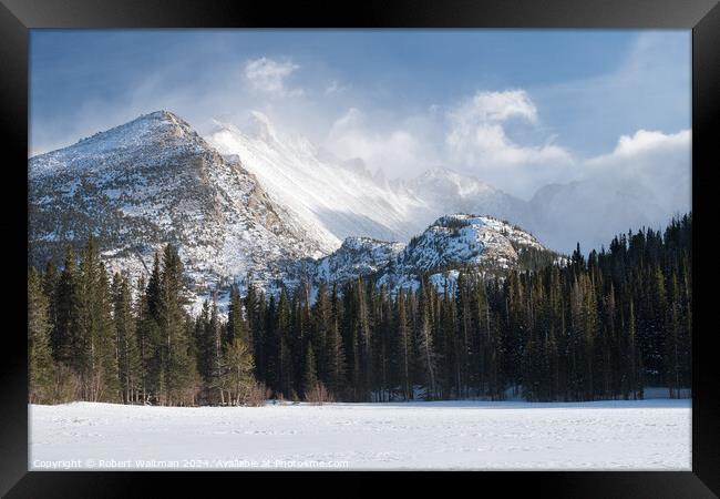 Dramatic Winter weather storm on 14,259 Foot Longs Peak viewed from frozen snow covered Bear Lake. Framed Print by Robert Waltman