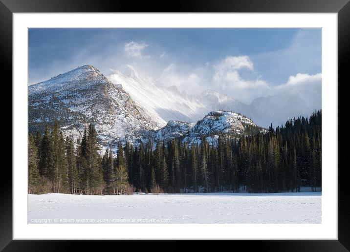 Dramatic Winter weather storm on 14,259 Foot Longs Peak viewed from frozen snow covered Bear Lake. Framed Mounted Print by Robert Waltman