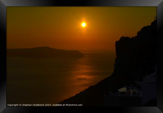 Sun setting over Oia Framed Print by Stephen Chadbond