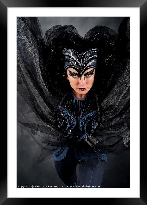 Bat Woman Framed Mounted Print by PhotoStock Israel