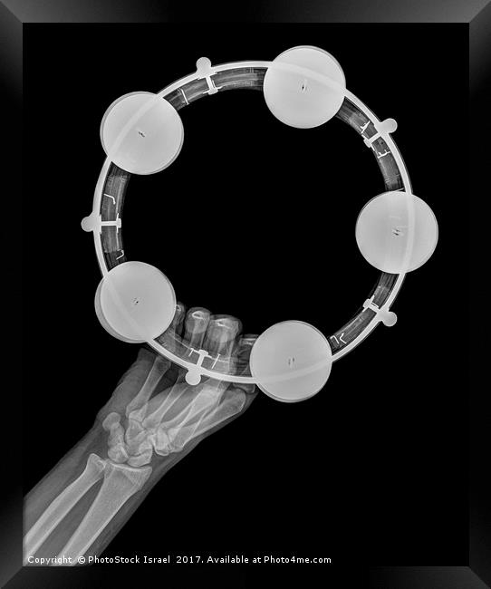 Tambourine under x-ray  Framed Print by PhotoStock Israel