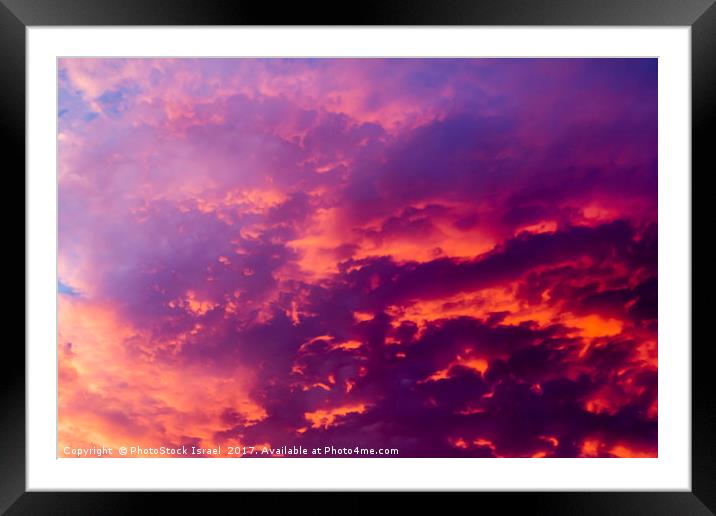 red cloudscape at sunset. Framed Mounted Print by PhotoStock Israel