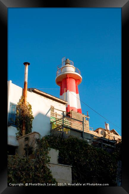 Light house at the old Jaffa port, Israel Framed Print by PhotoStock Israel