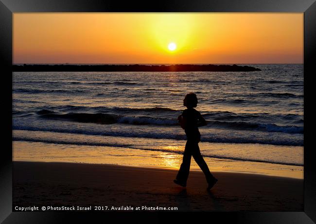 Israel, Tel Aviv, running on the beach Framed Print by PhotoStock Israel