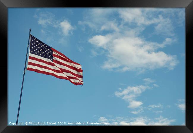 Americav flag with clouds and blue sky background Framed Print by PhotoStock Israel