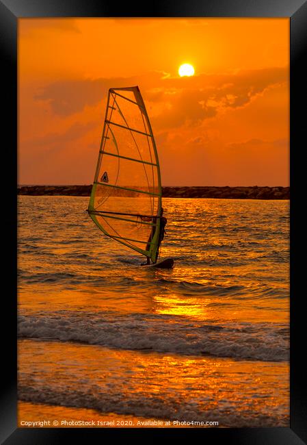 windsurfing at sunset Framed Print by PhotoStock Israel
