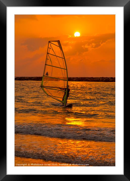 windsurfing at sunset Framed Mounted Print by PhotoStock Israel
