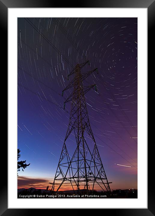 Power line and star trails Framed Mounted Print by Gabor Pozsgai