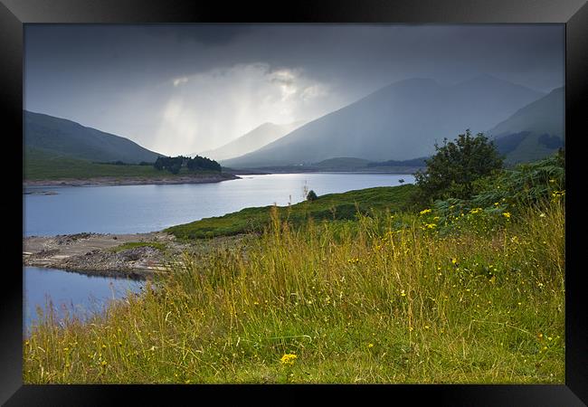 Scottish landscape with grey clouds Framed Print by Gabor Pozsgai