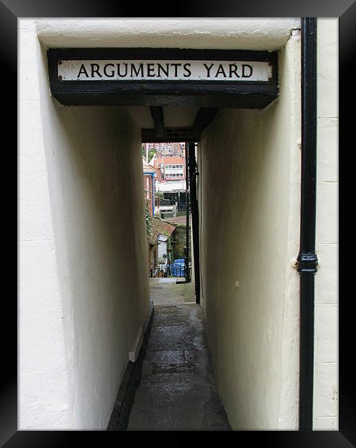 Arguments Yard Framed Print by Lindsay Parkin